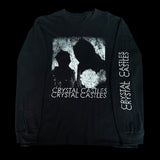 Black long-sleeve shirt with 'Crystal Castles' graphic design on a black background