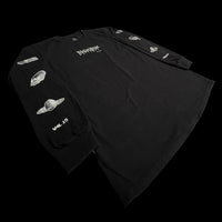 Front Angled view black long sleeve shirt featuring white prints of alien head UFO and ringed planet images on sleeve and INHUMANUM logo on chest– INHUMANUM Hvmanoid design