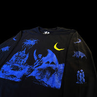 Angled front view of INHUMANUM Inferno shirt – Lucifer seated by a gothic castle under yellow crescent moon with bat wings and candles printed on sleeves
